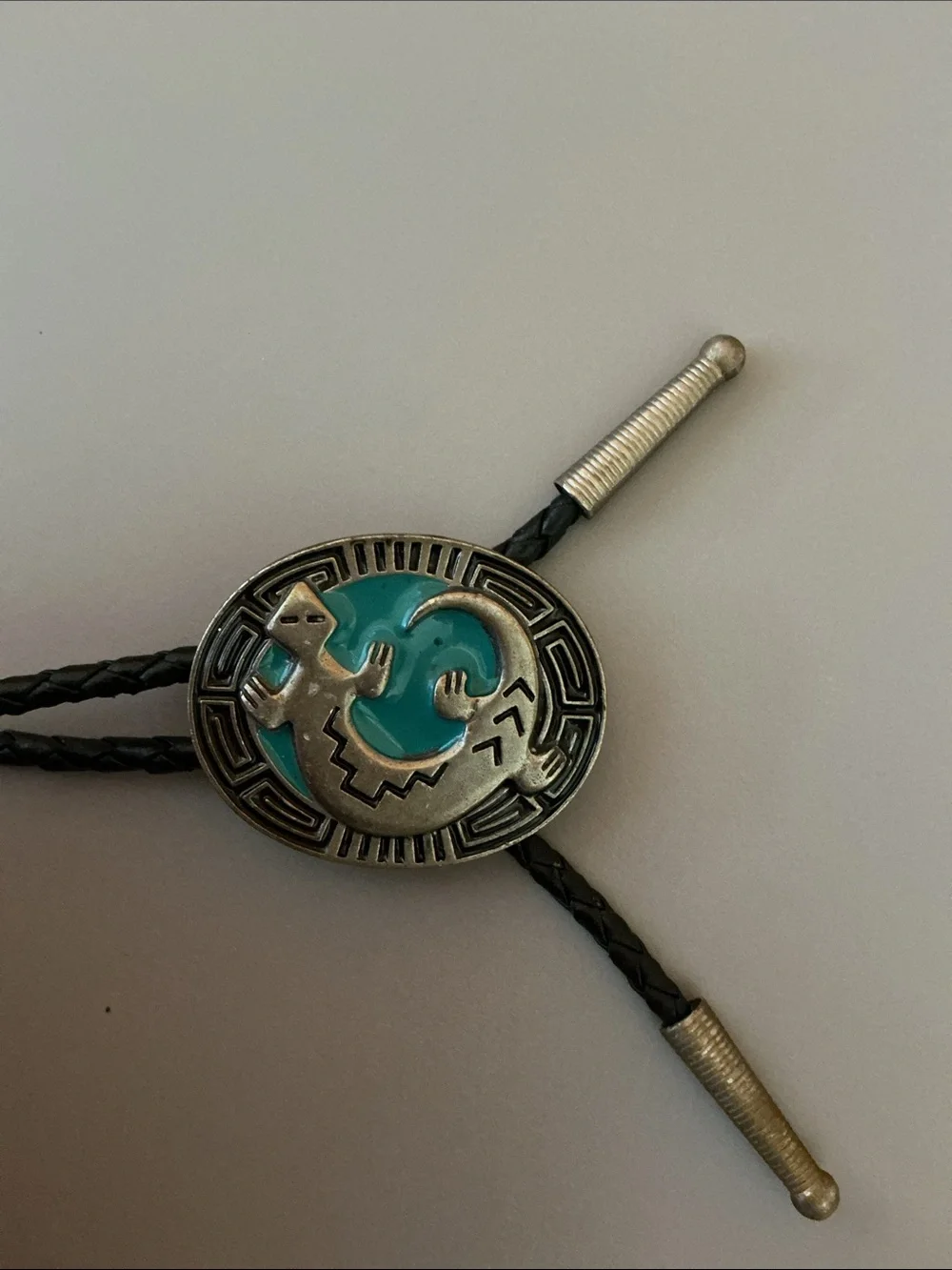 Siskiyou Buckle Co. pewter bolo tie with a braided cord and metal aglets